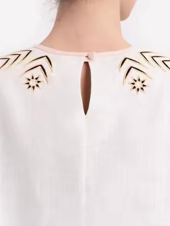 White and black star patched shirt