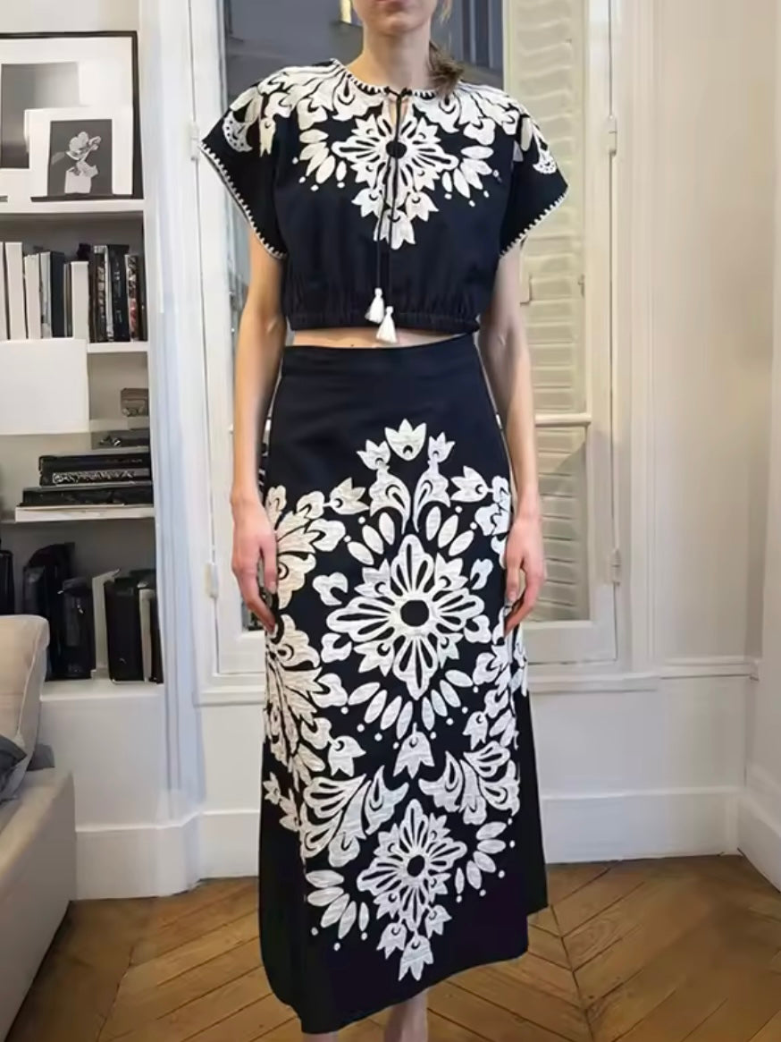 Blue set top and skirt with floral embroidered details