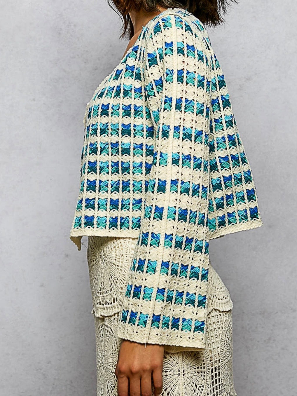 Beige and blue squared knitted shirt