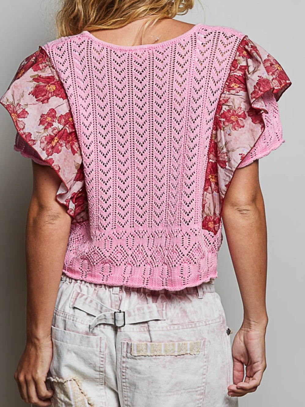 Knitted pink crochet ruffled crop top