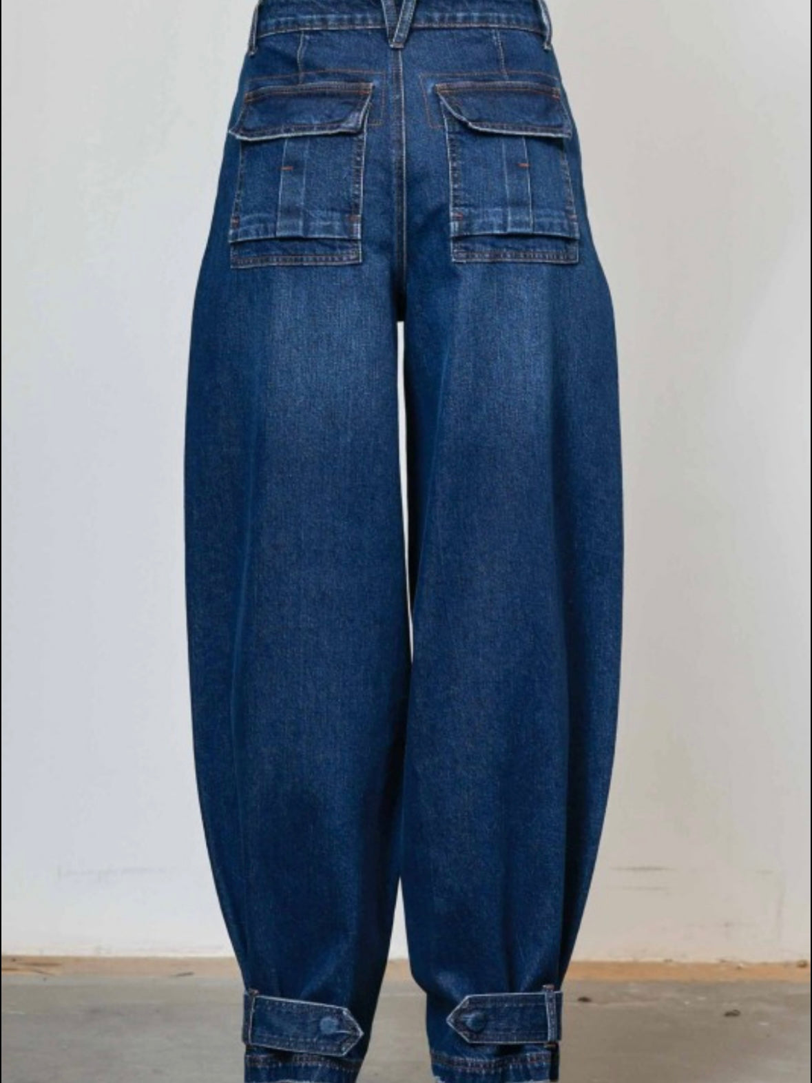 Blue baggy ankle buckle strapped jeans