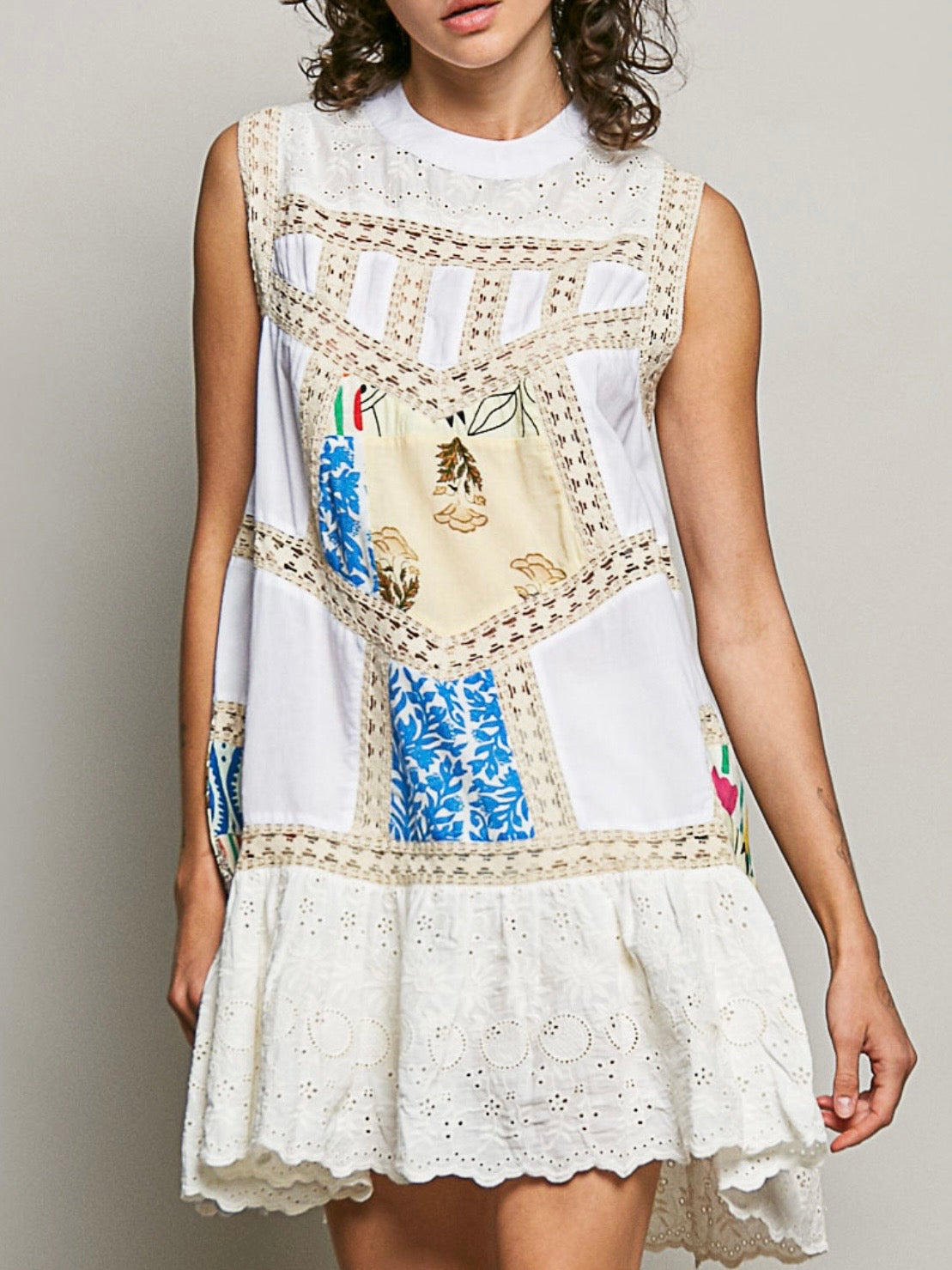 White and crochet sleeveless mini dress