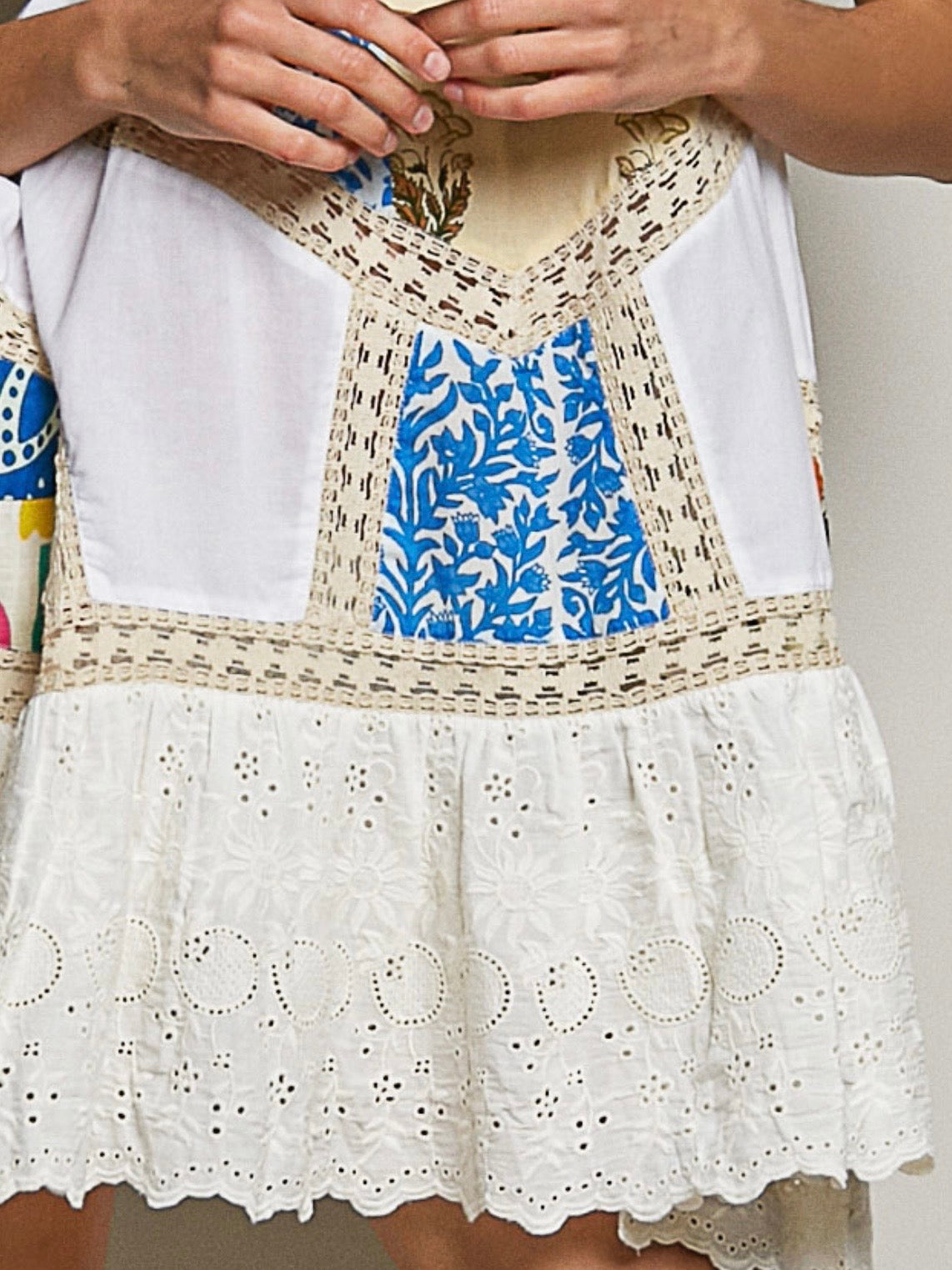 White and crochet sleeveless mini dress