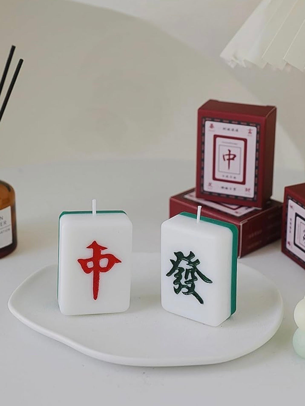 Red and green back mahjong tile Night candle