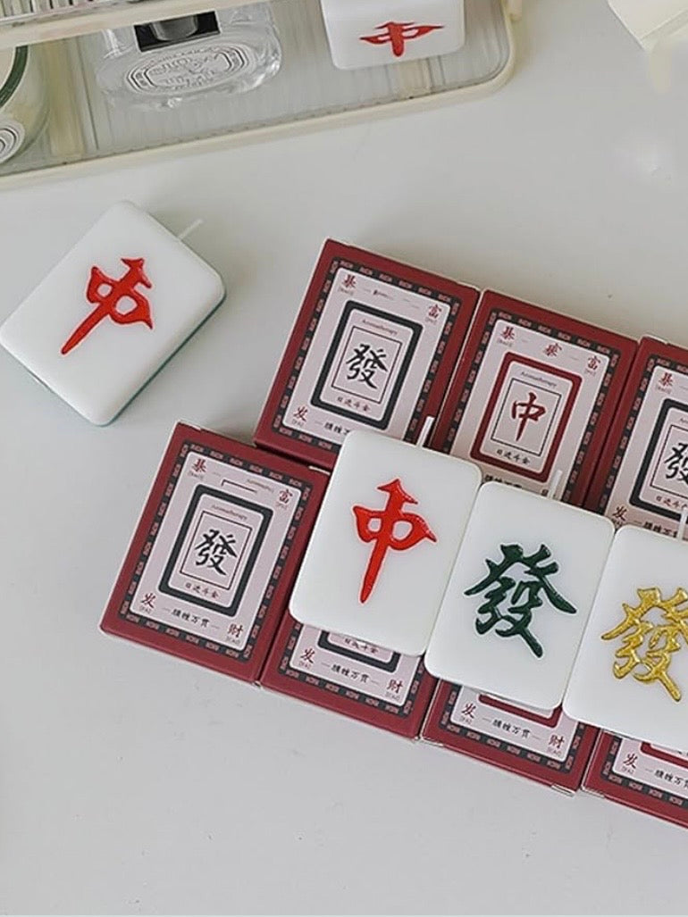 Red and green back mahjong tile Night candle