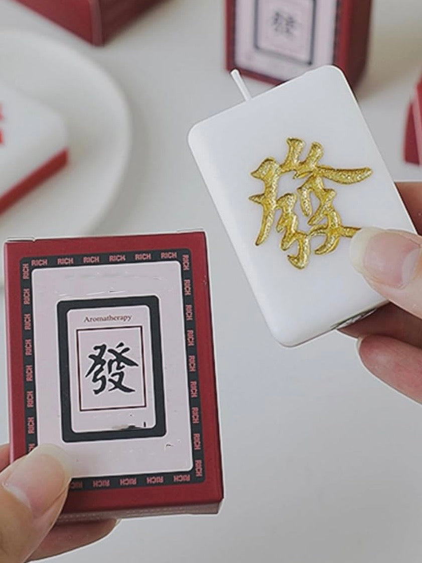Red and green back mahjong tile Night candle