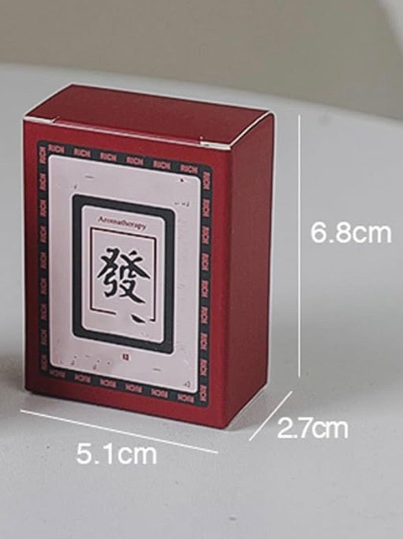 Red and green back mahjong tile Night candle