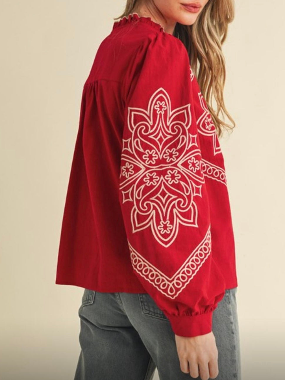 Red and white embroidered floral shirt