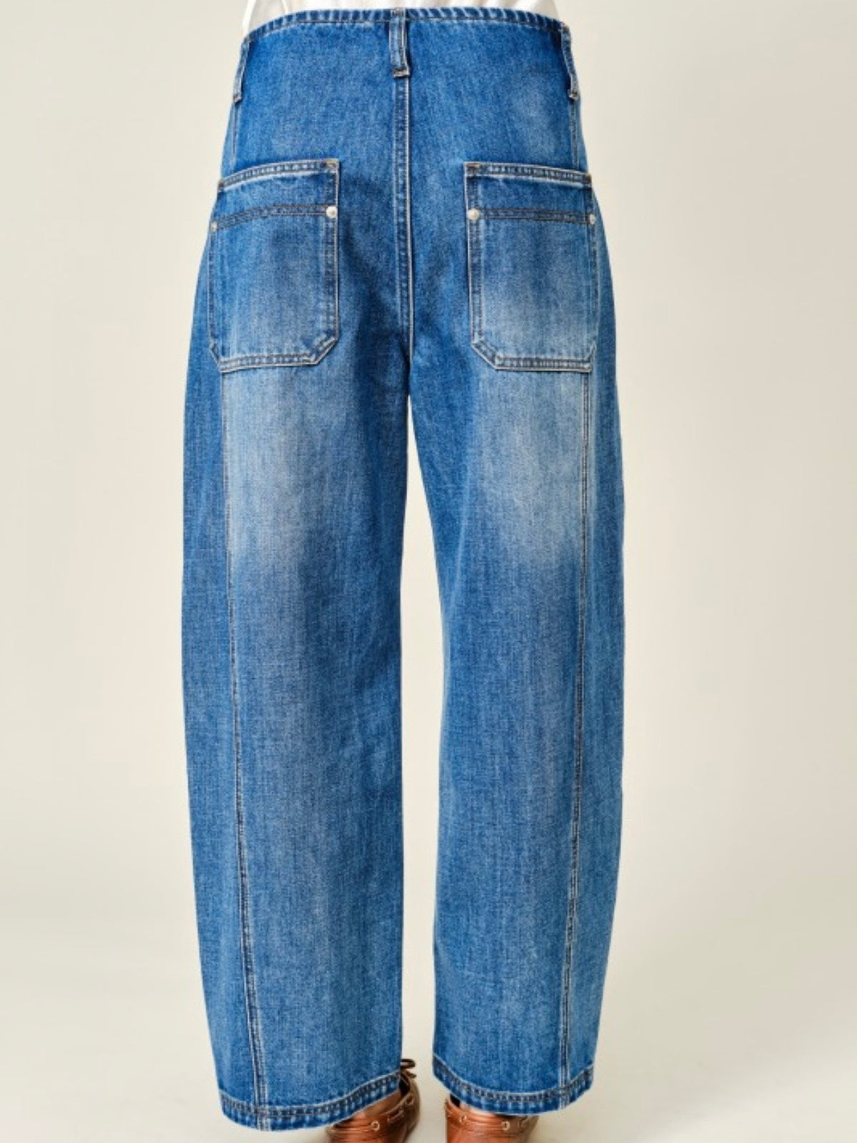 Blue jeans barrel seams pants