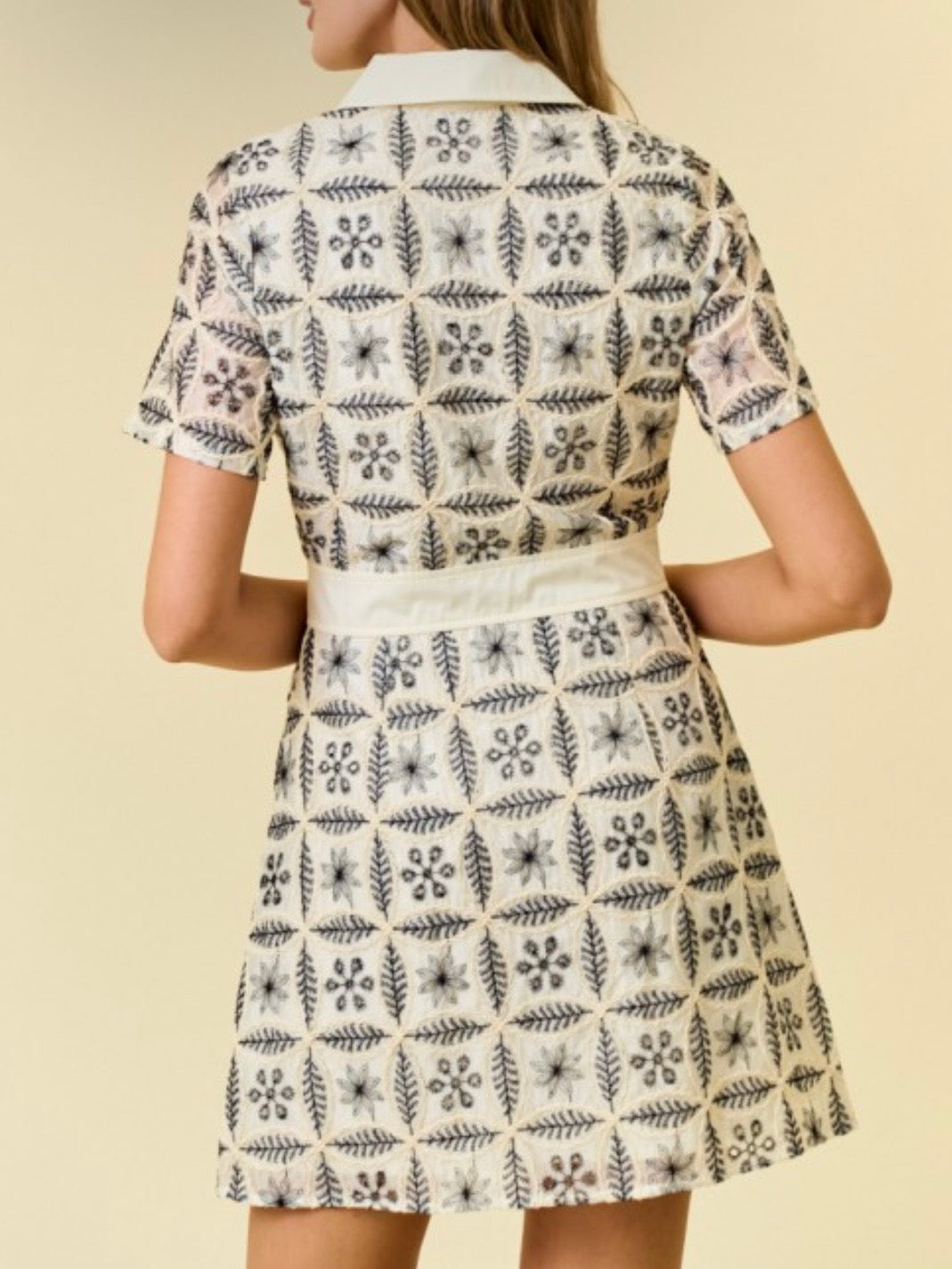 Beige and black floral details open front mini dress