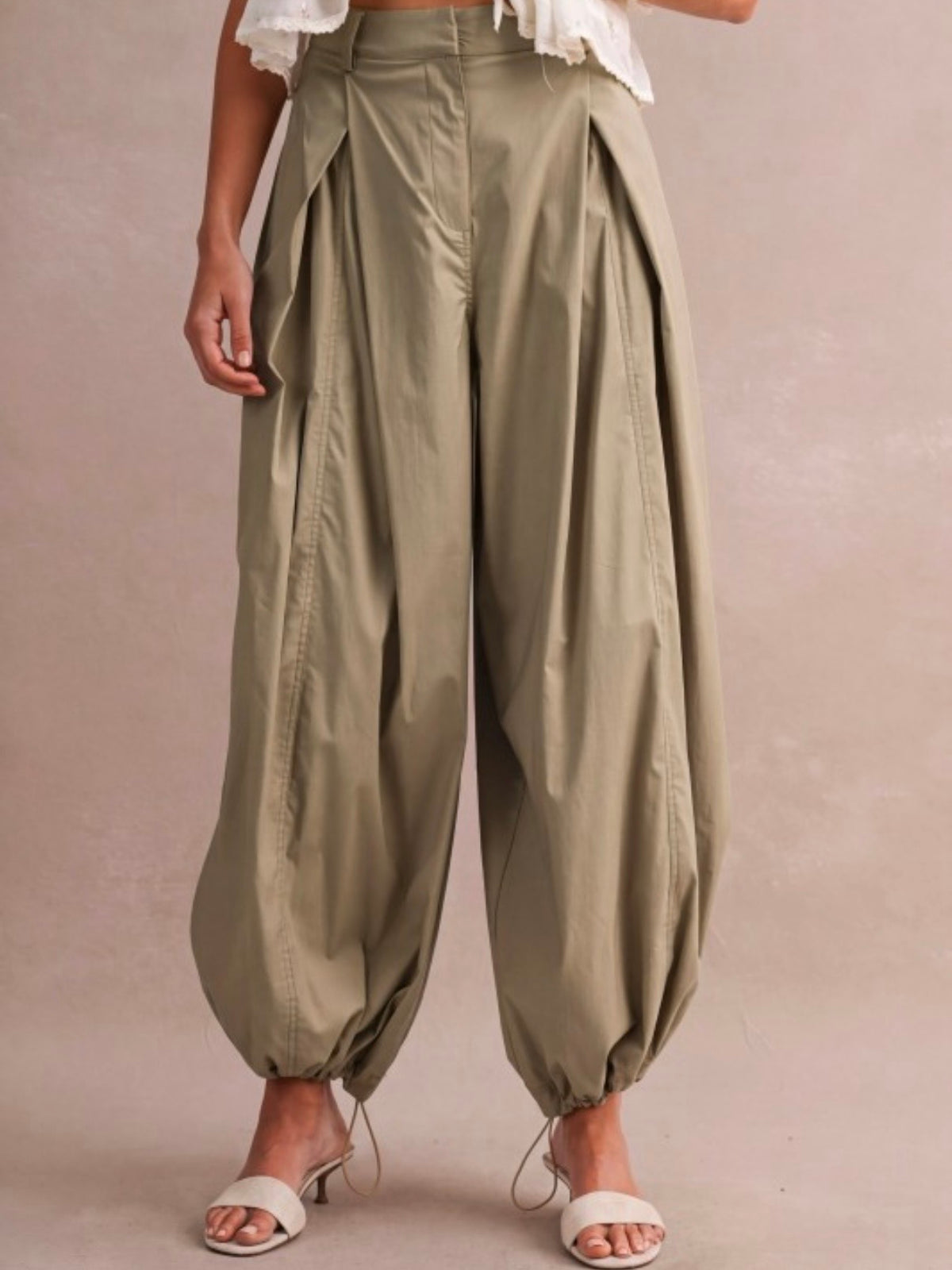 Beige High-wasted balloon leg front pleats wrap style pants)