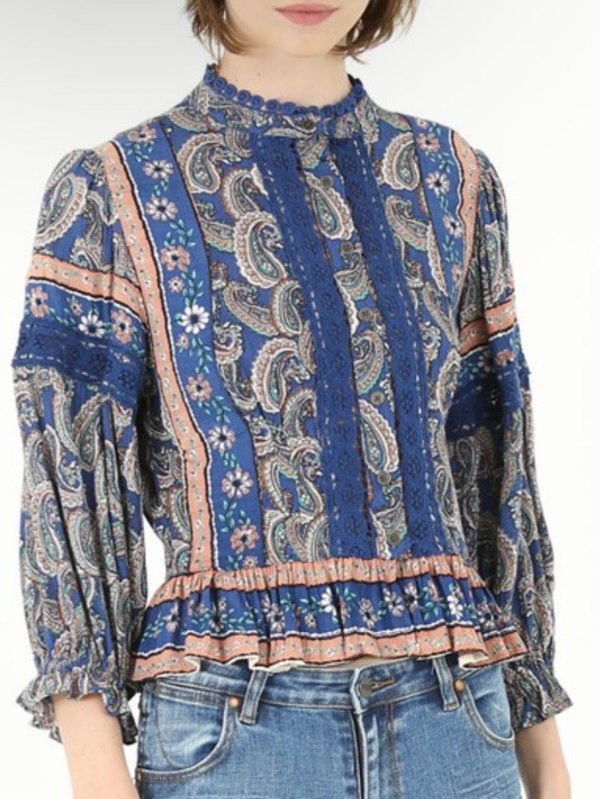Blue ruffled floral and bacterial shirt