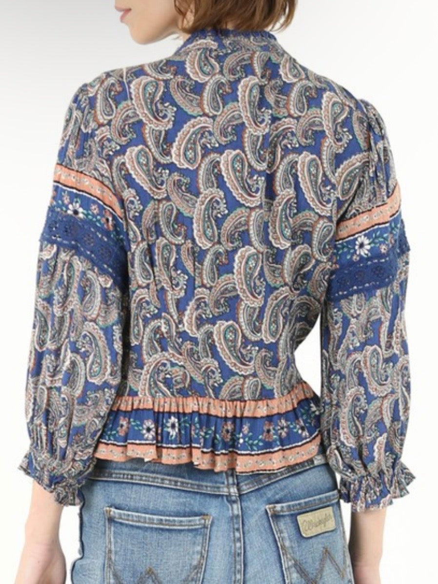 Blue ruffled floral and bacterial shirt