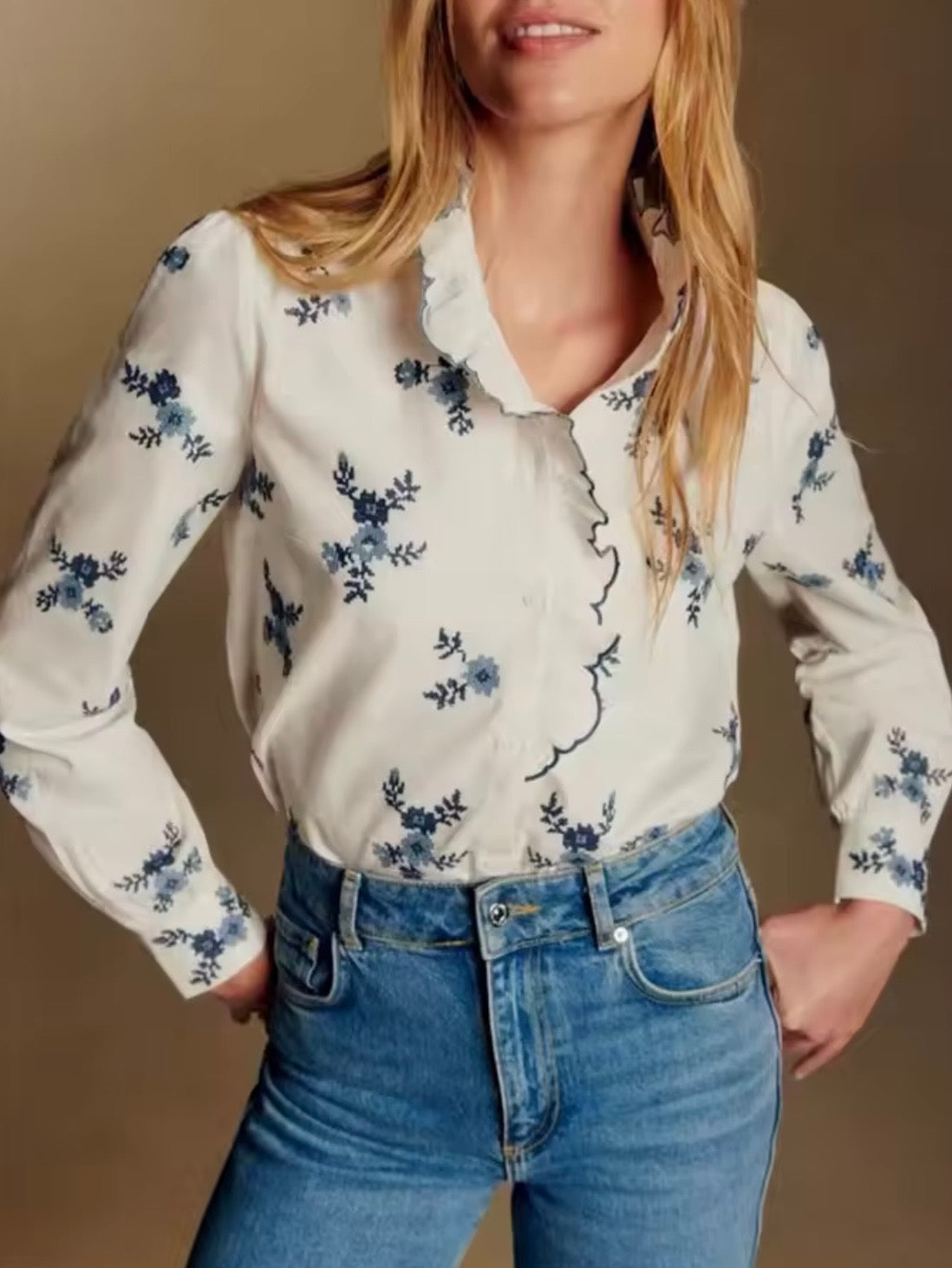White and blue floral ruffled shirt
