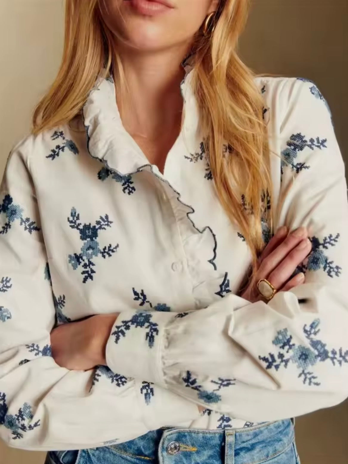 White and blue floral ruffled shirt