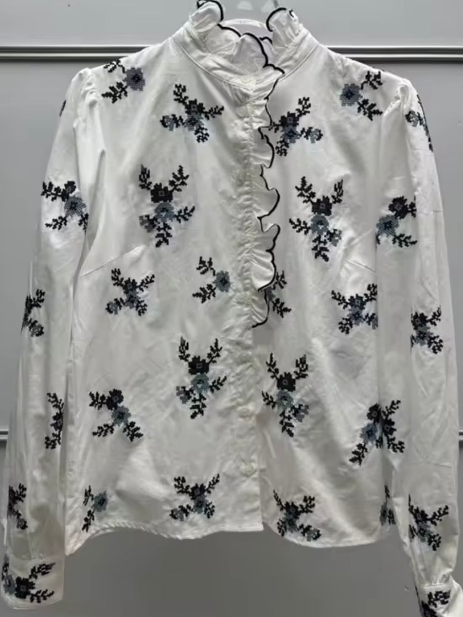 White and blue floral ruffled shirt