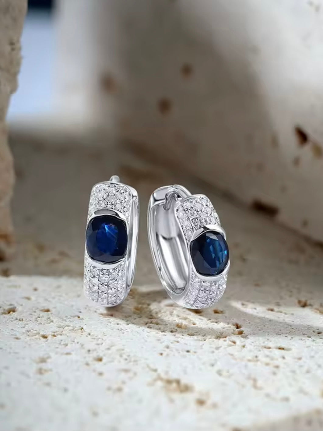 White gold 14k sparkling diamonds and blue oval sapphire loop earrings