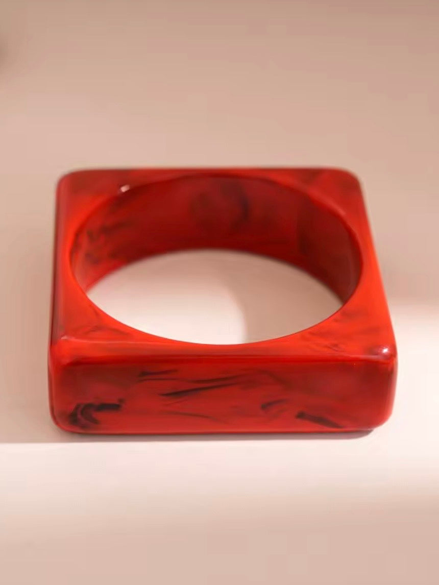 Red mixed designs resin studded brown wide bracelet