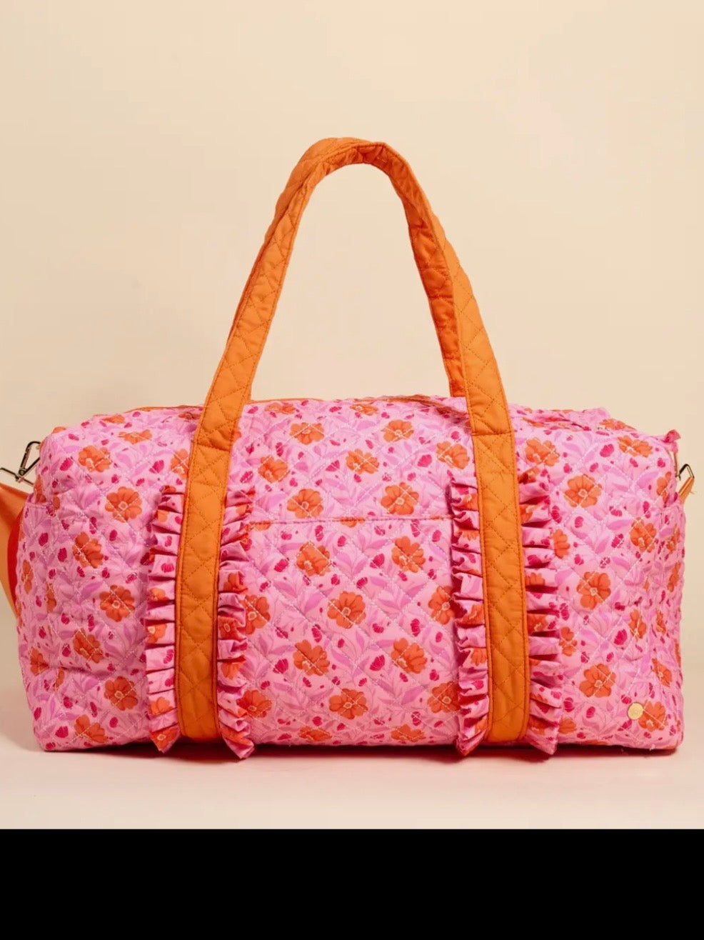 Pink and orange floral quilted handbag