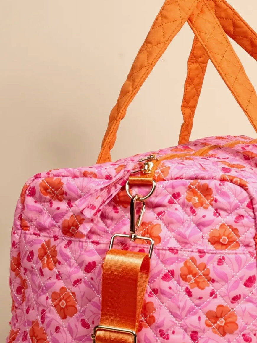 Pink and orange floral quilted handbag