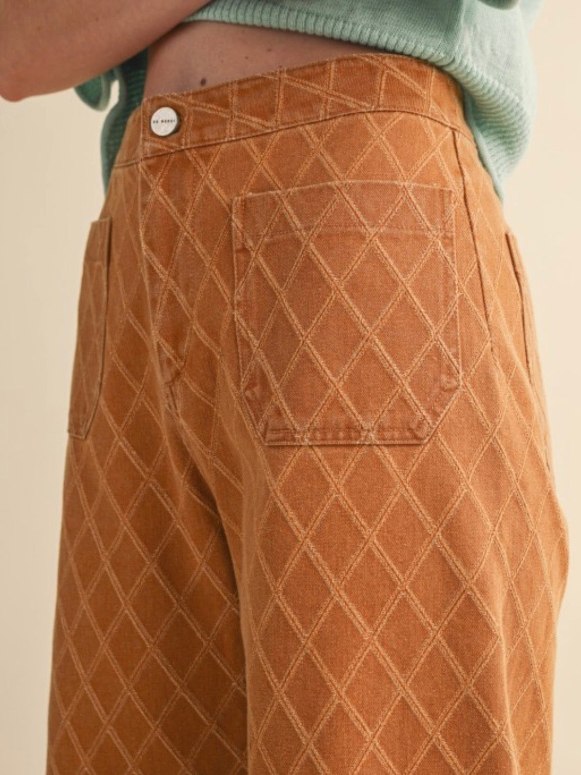 Orange diamonds seams pattern fabric pants