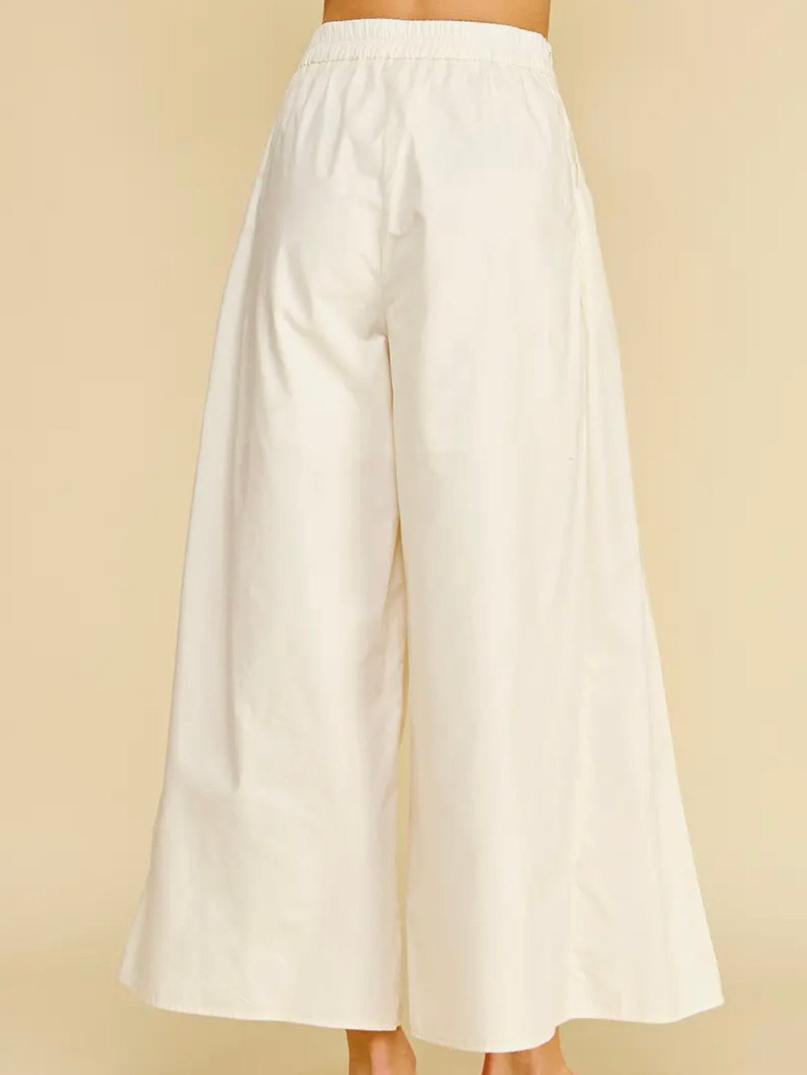 Off white solid colors wide leg pleated pants