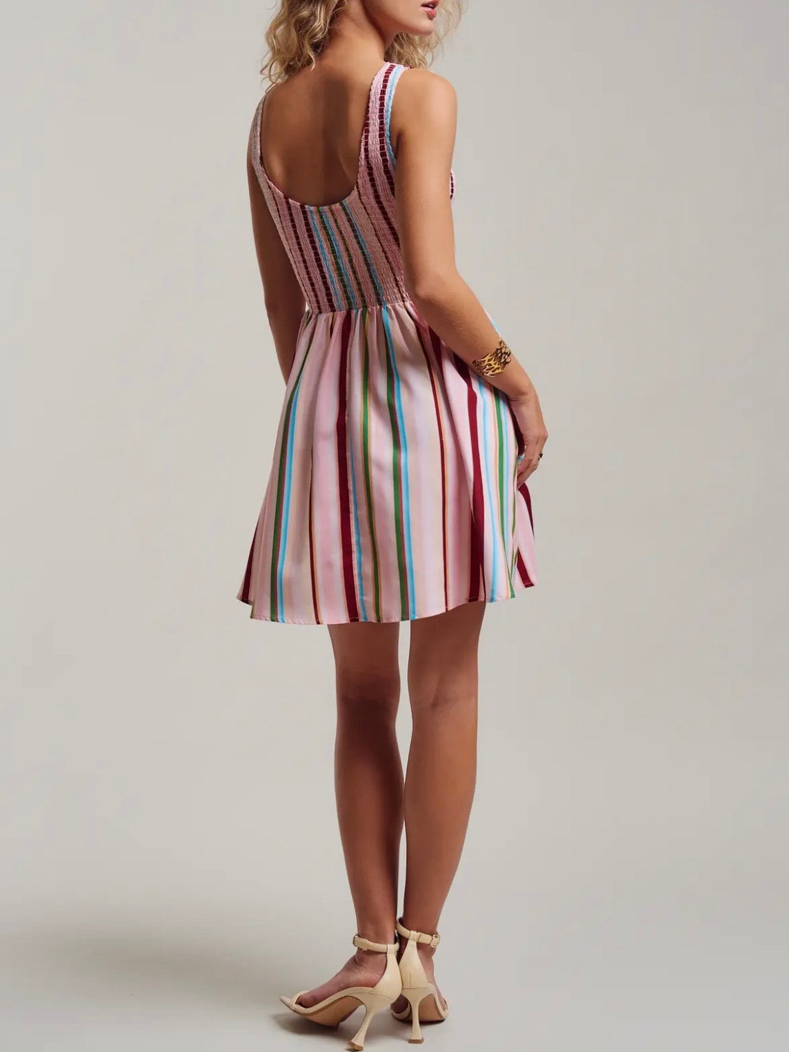 Pink multicolored striped draped mini dress