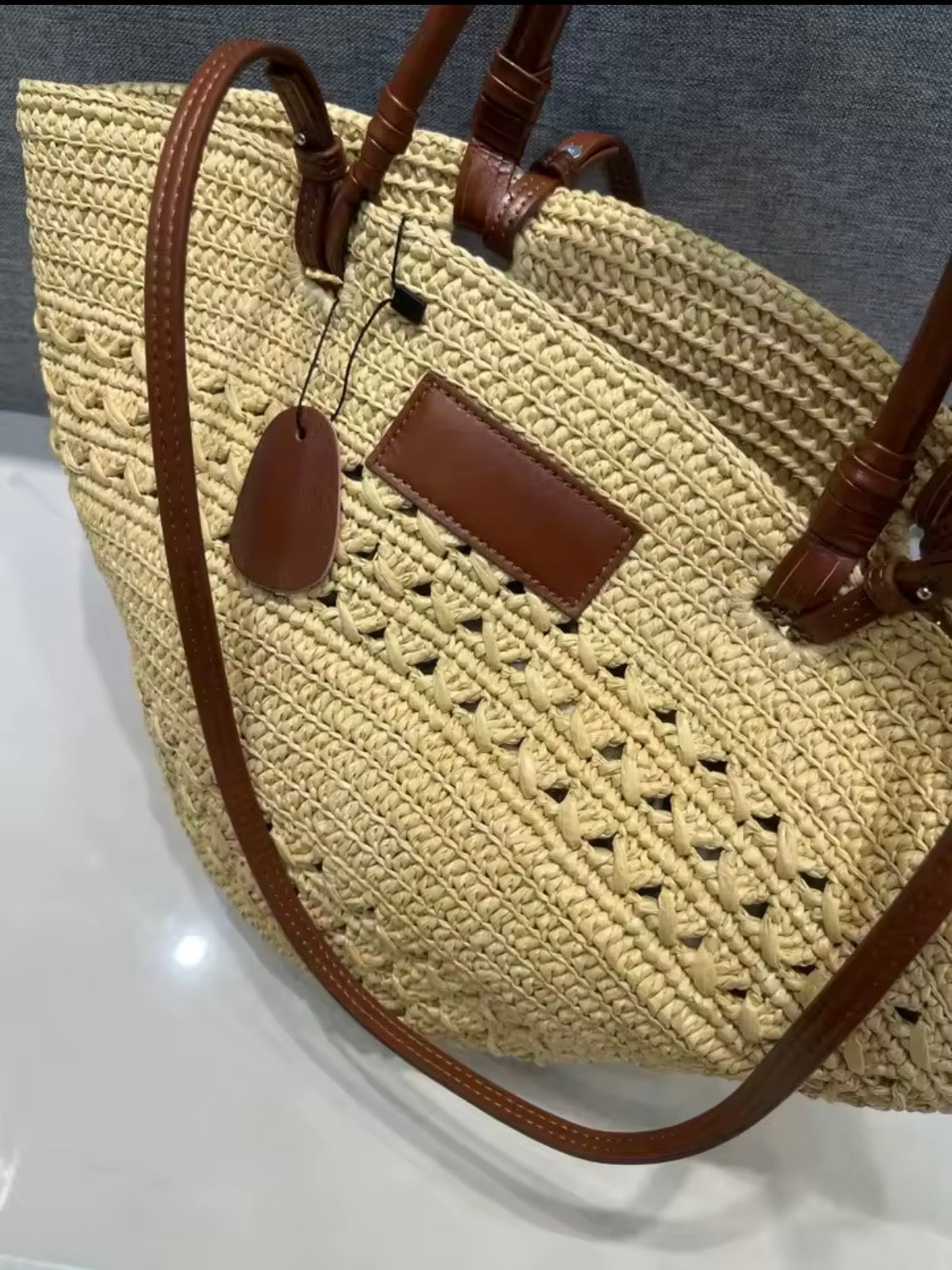 Beige natural straw basket bag