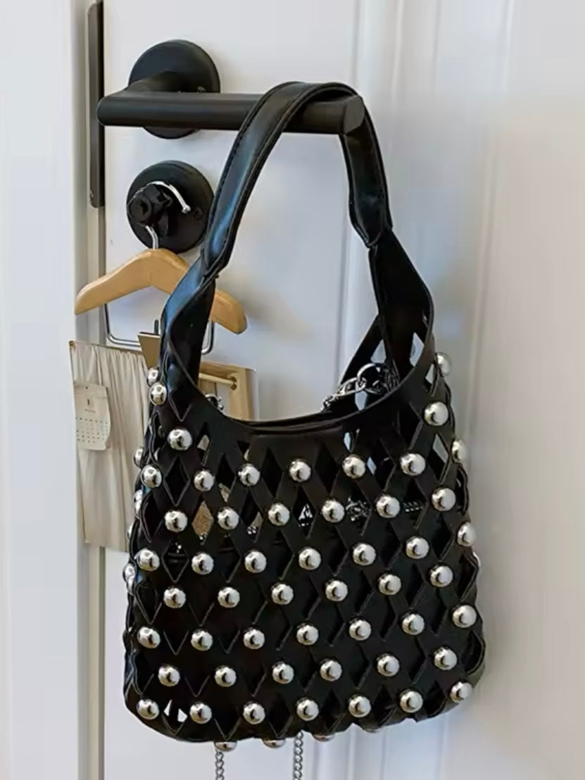 Solid colors studded net cutout handbag