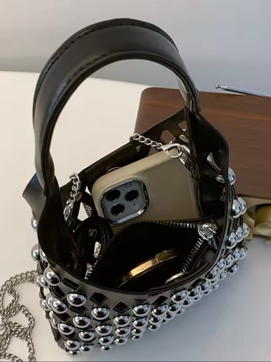 Solid colors studded net cutout handbag