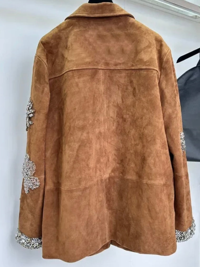 Brown leather jacket with floral details