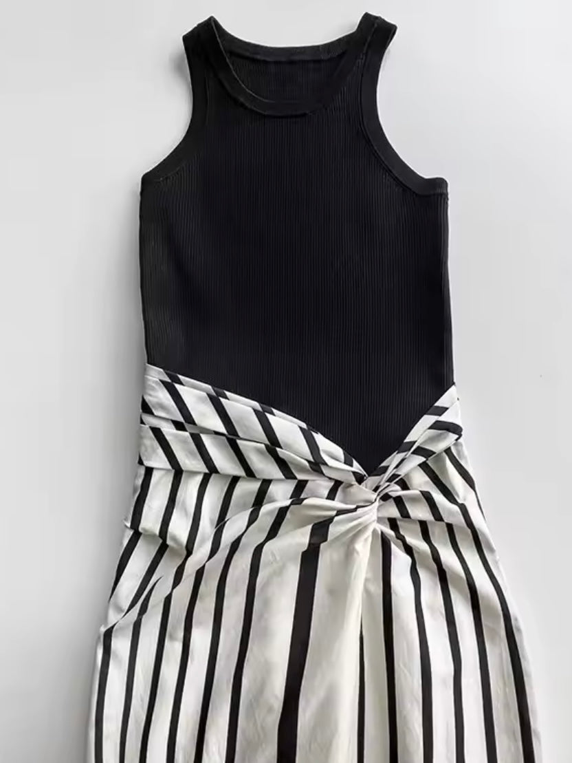 Fake two pieces dress. Black top and striped bottom