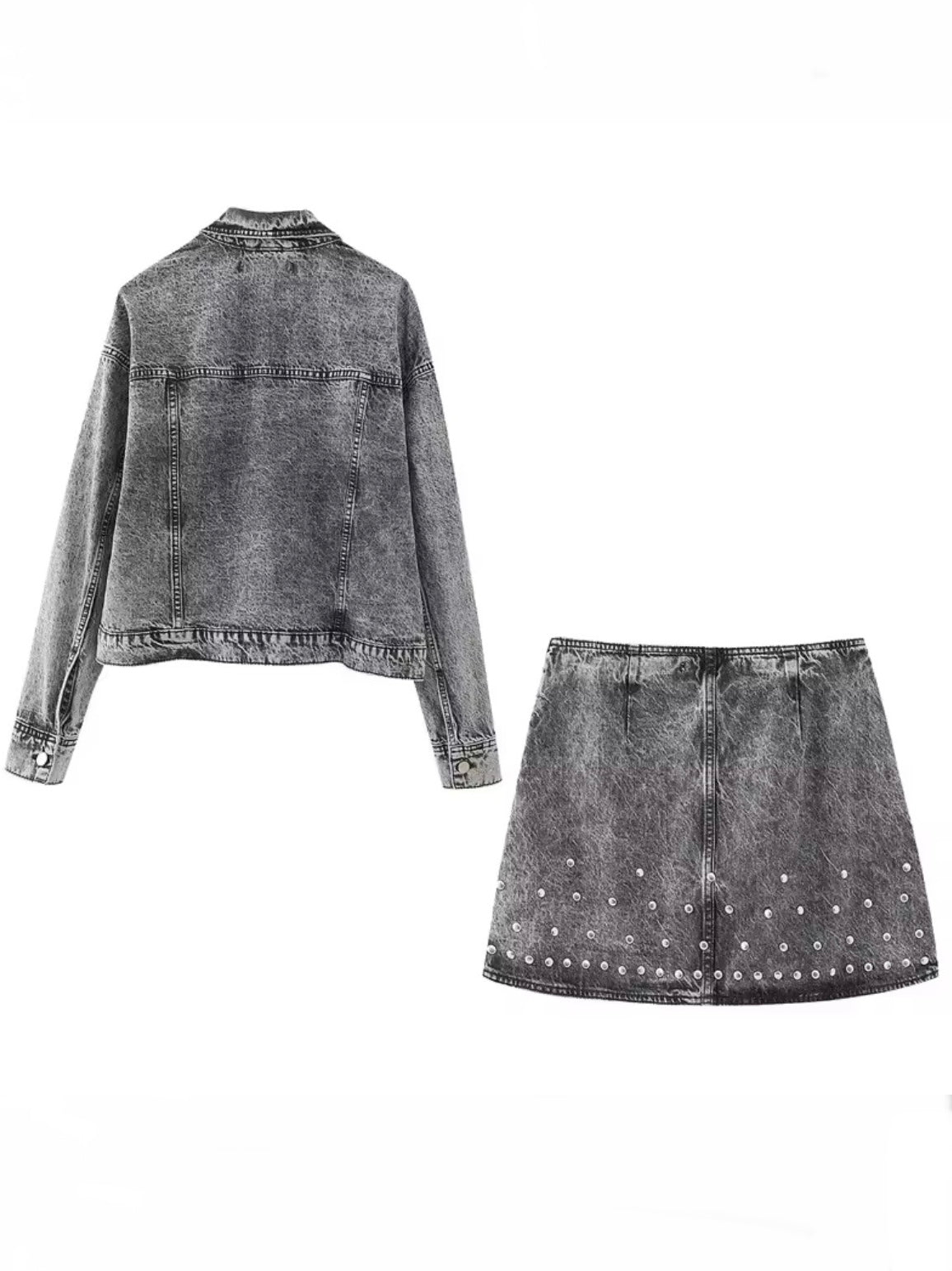 Black jeans and studded set of jacket and mini skirt