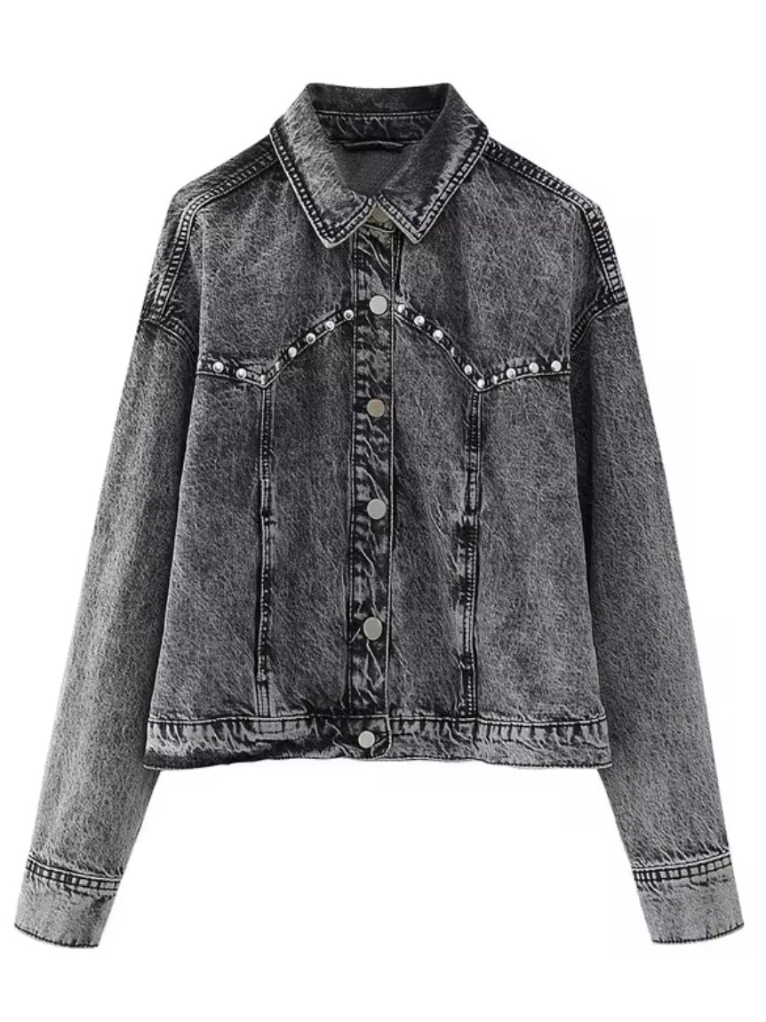 Black jeans and studded set of jacket and mini skirt
