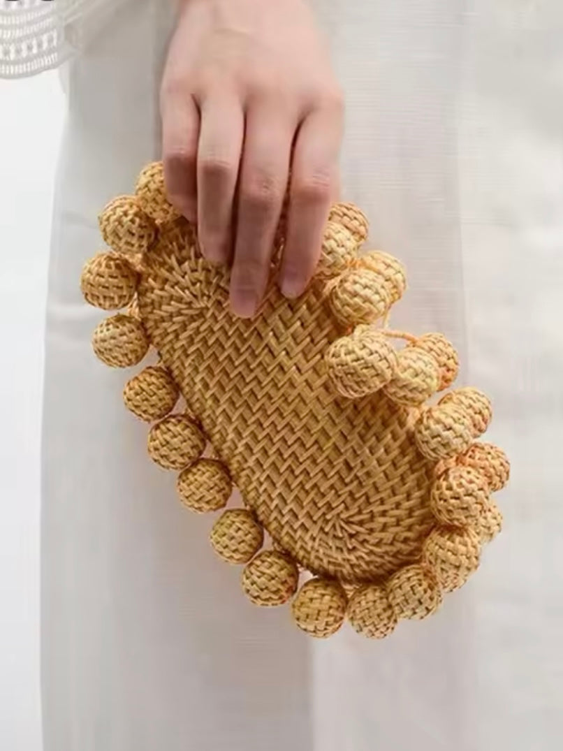 Natural balls straw clutch