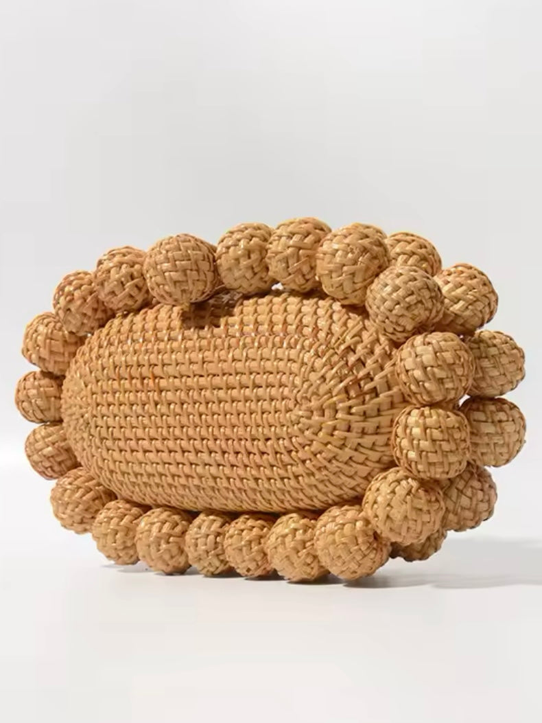 Natural balls straw clutch