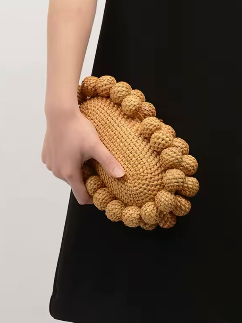 Natural balls straw clutch