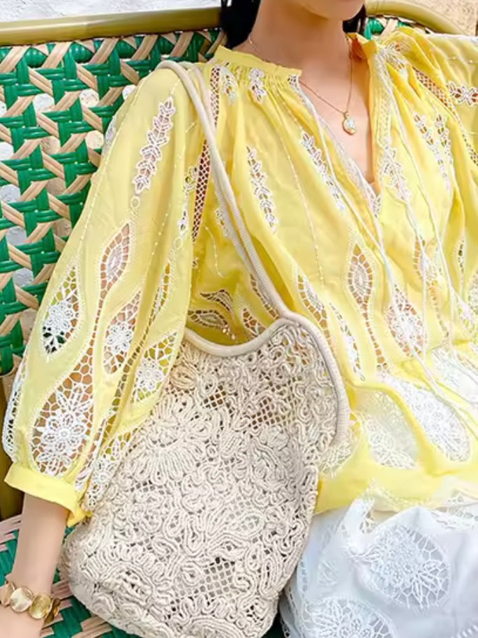 Yellow and white embroidered shirt