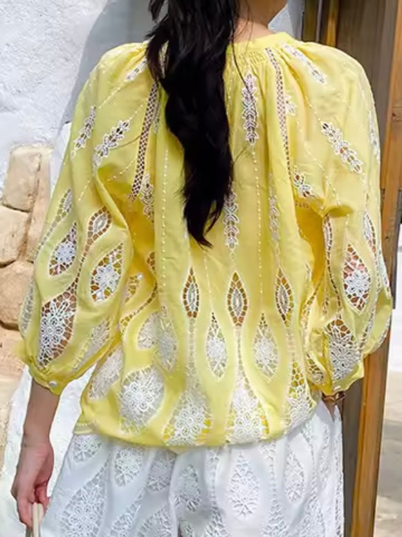 Yellow and white embroidered shirt
