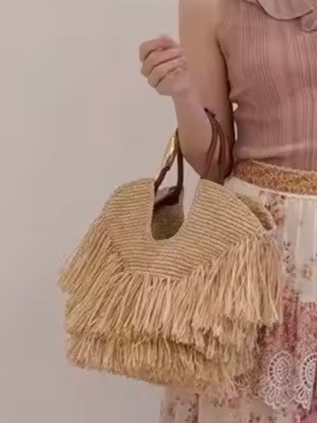 Natural straw hairy handbag