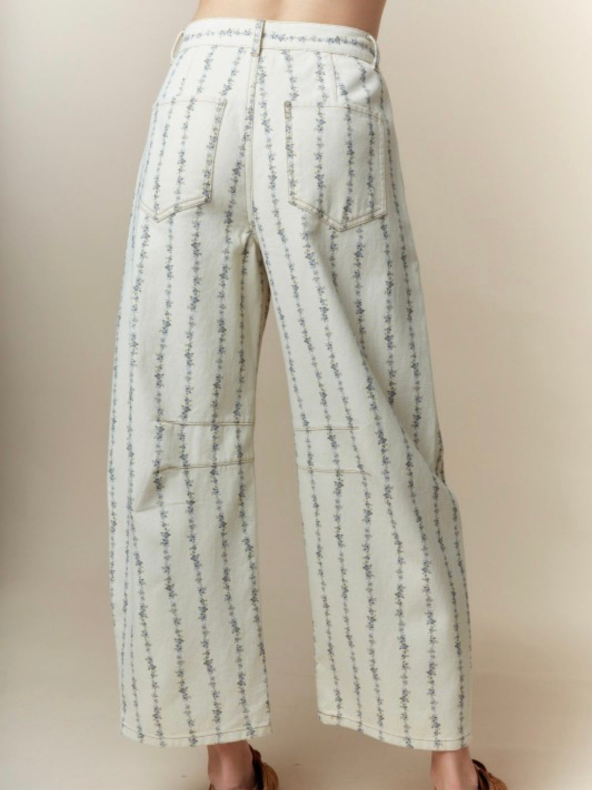 Beige floral printed barrel jeans pants