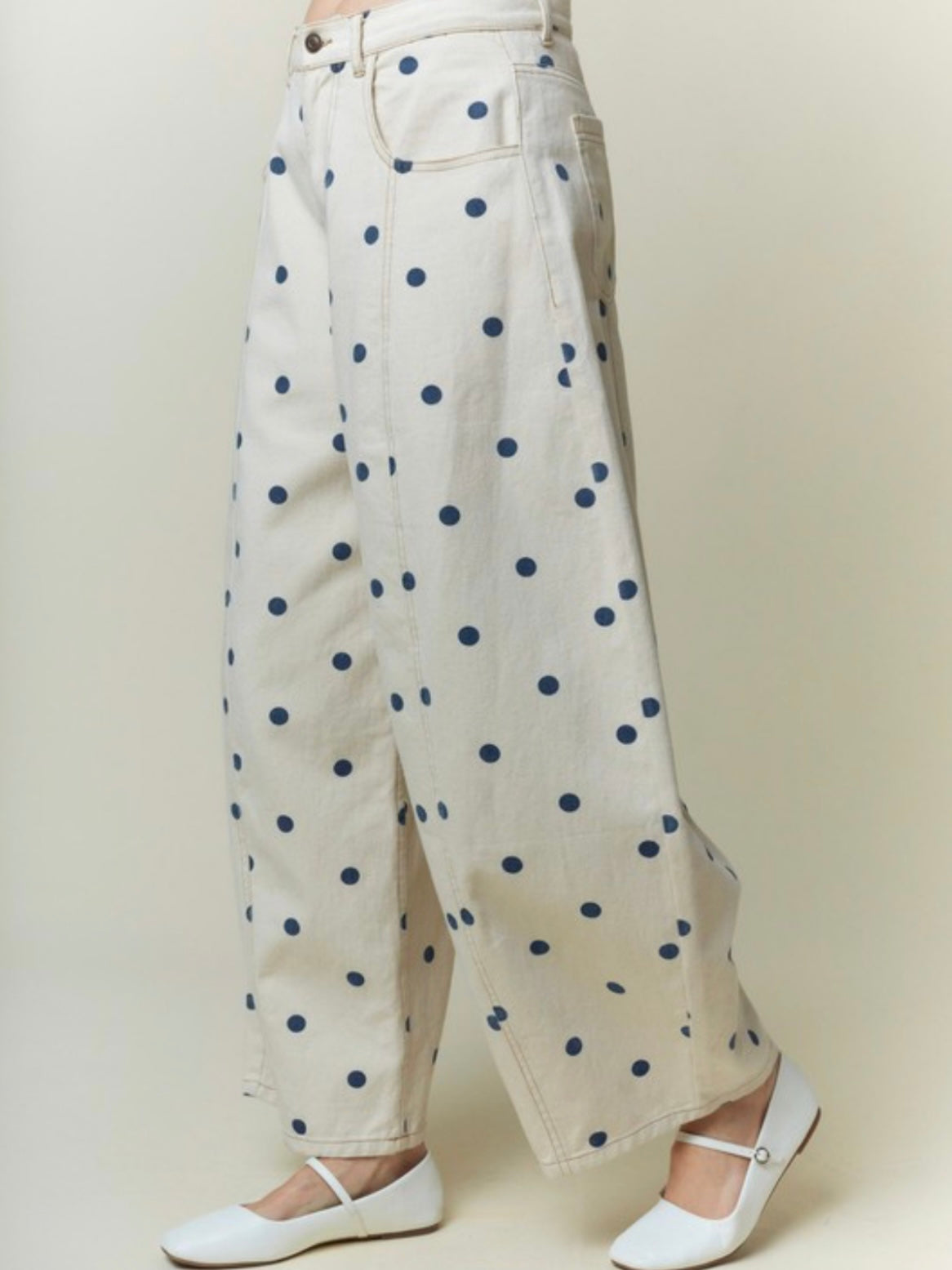 Beige polka dot printed barrel jeans pants
