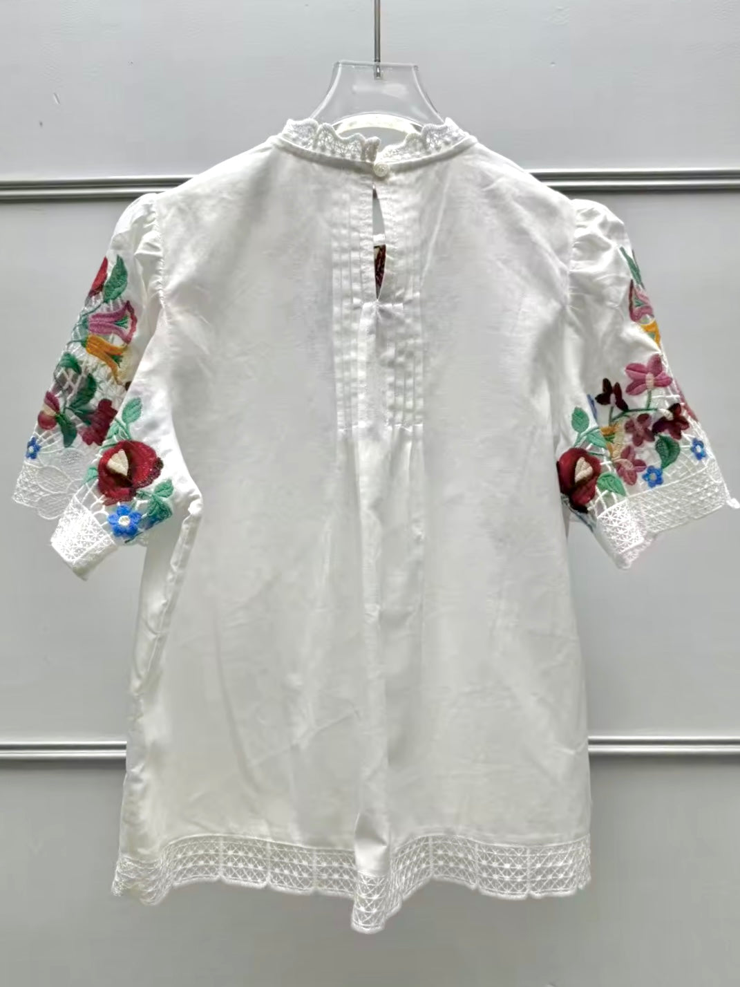 Off white floral embroidered shirt sleeves top