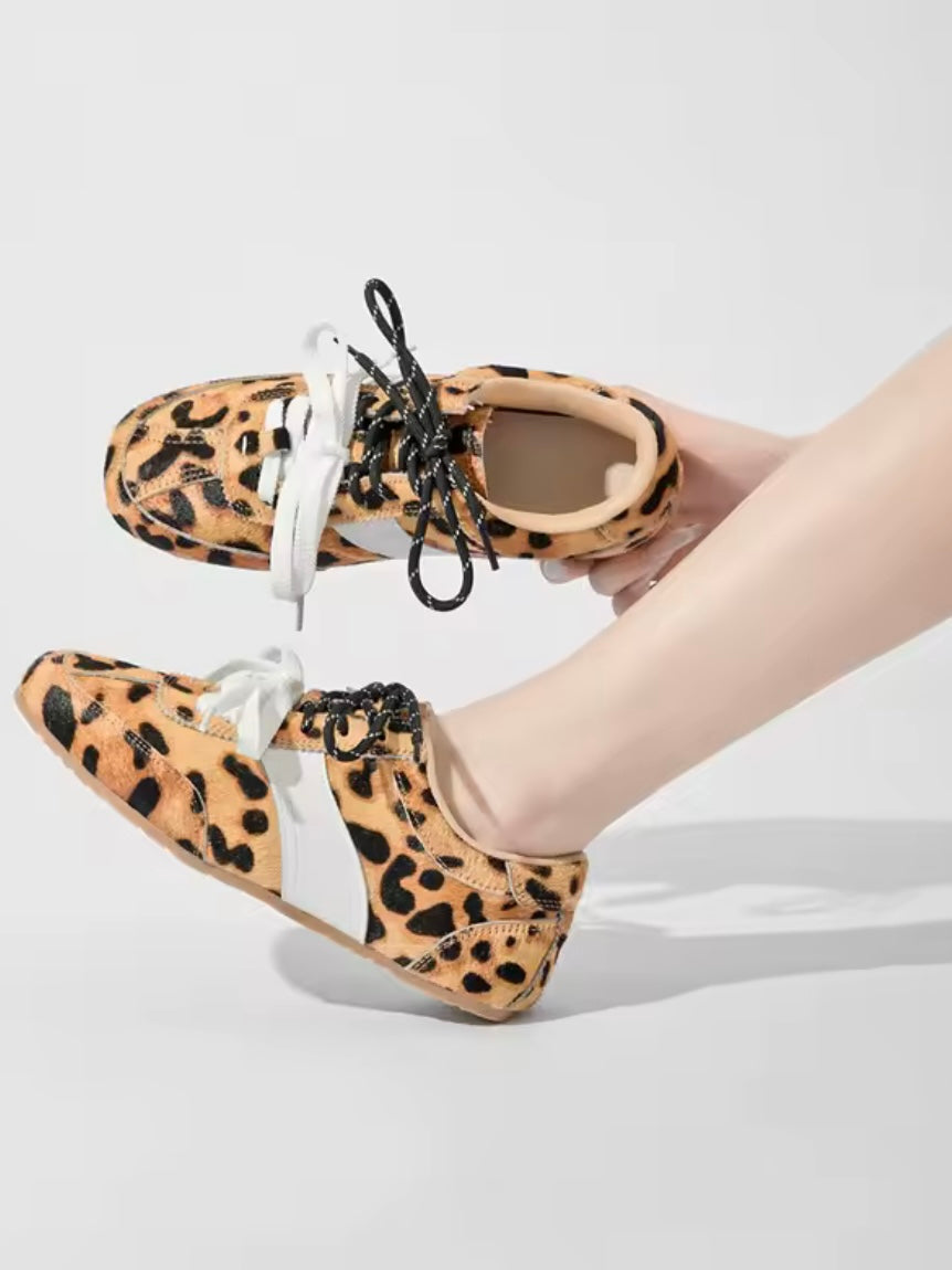 Animal printed double lace up sneakers