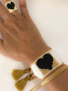 Gold and black heart. Set of 3 pieces, ring and braided bracelets