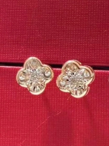 Gold shamrock earrings
