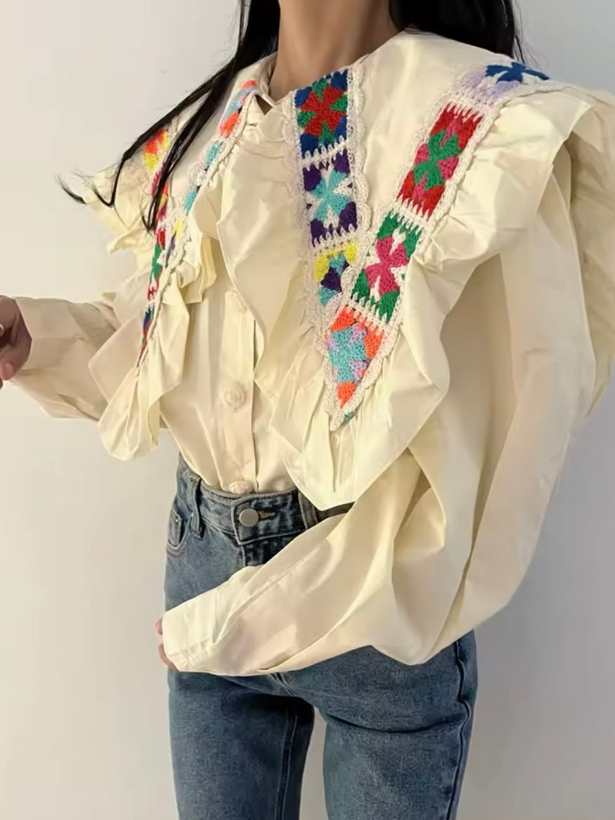 Off white flaps neck embroidered ethnic colored details shirt