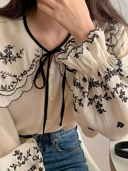 Black and beige embroidered details shirt