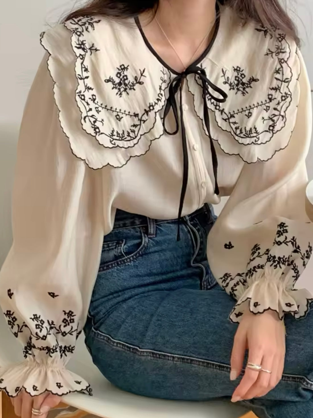 Black and beige embroidered details shirt