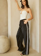 Sporty Satin effect track pants with stripes